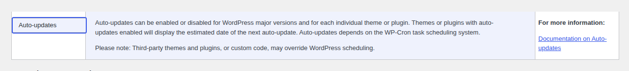 WordPress Updates help panel explaining separate auto-update controls and scheduled behavior