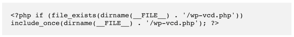 PHP snippet that includes wp-vcd.php when the malicious file exists.